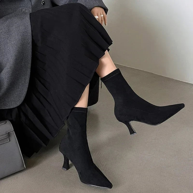Black suede pointed toe sock boots