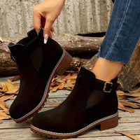 Black block heel ankle boots with buckle strap