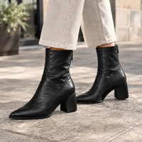 Black pointed toe ankle boots with block heel